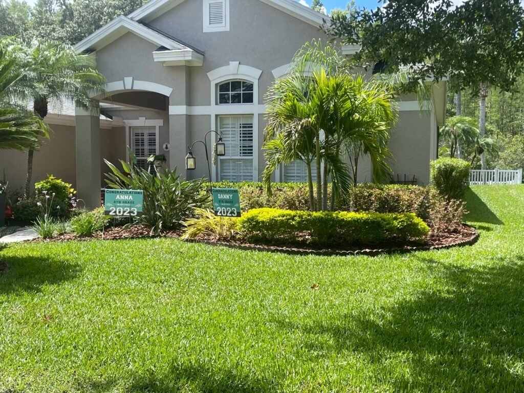 tropical yard in villa rosa, FL maintained by copperhead property maintenance
