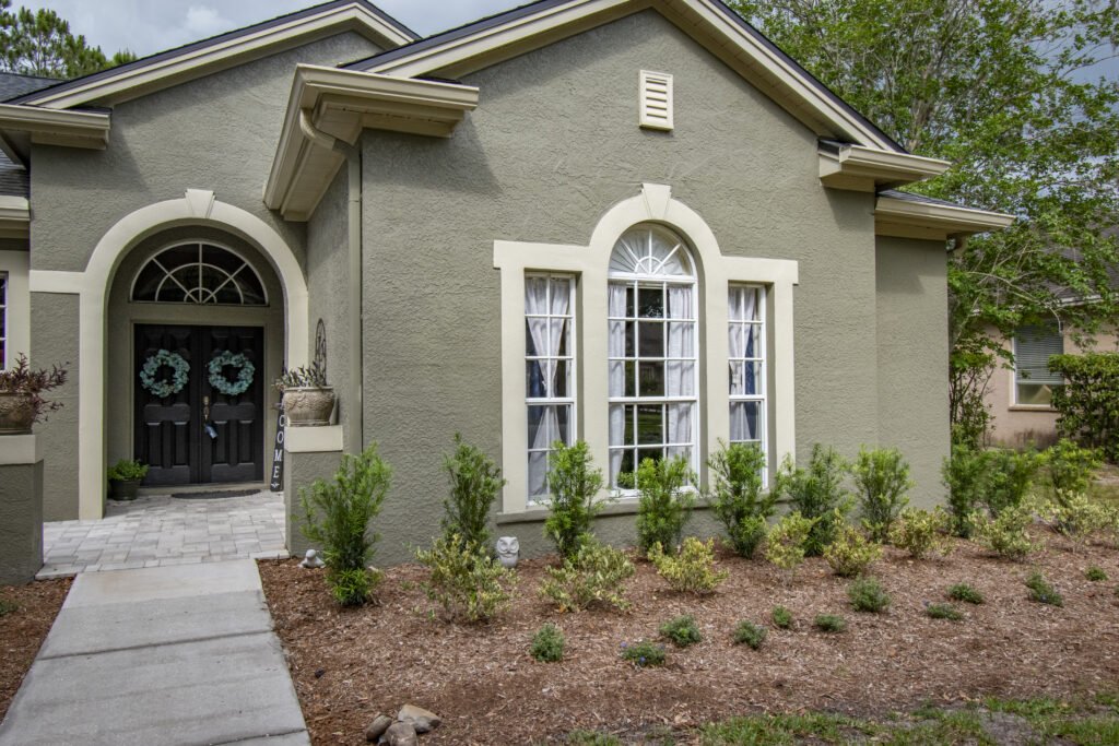 Spring planting season, fresh new plants in brown mulch beds in Bexley FL