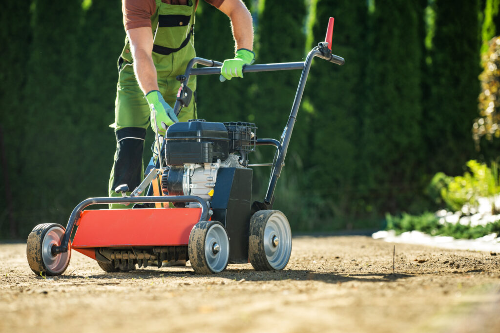 Copperhead property maintenance aerating a yard