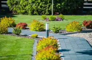 HOA compliant Lutz lawns perfectly manicured community entrance - HOA compliant Lutz lawns
